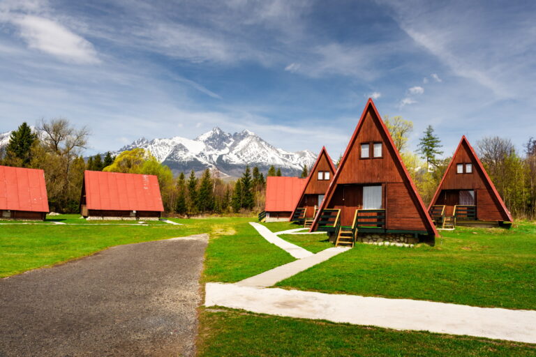 Camping with red wooden houses in Tatra Mountains